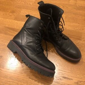 Black leather combat boots